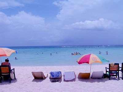 Cruise travelers having a great time on beautiful beaches of Cozumel.